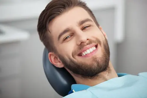 Man smiling after treatment